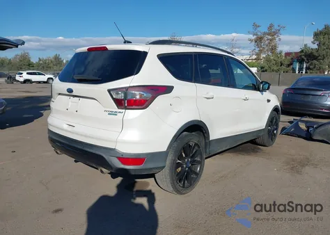 2017 Ford Escape Titanium z USA, uszkodzony, nr VIN 1FMCU0J90HUB29788